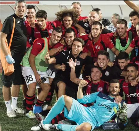  ??  ?? Lincoln Red Imps gather together for a team photo in 2016 after beating Celtic 1-0 in Gibraltar, a feat they