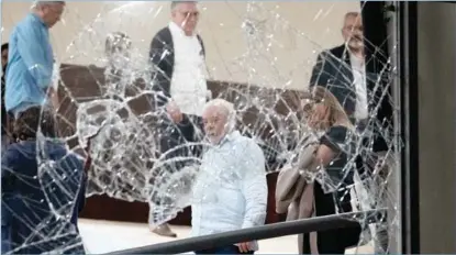  ?? ERALDO PERES / ASSOCIATED PRESS ?? Brazilian President Luiz Inacio Lula da Silva surveys the damage at the Planalto Palace in Brasilia after it was stormed, on Jan 8, by supporters of former president Jair Bolsonaro.