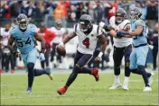  ?? ASSOCIATED PRESS ?? HOUSTON TEXANS QUARTERBAC­K DESHAUN WATSON (4) scrambles against the Tennessee Titans in the second half of Sunday’s game in Nashville, Tenn.