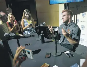  ?? Mark J. Terrill Associated Press ?? AT LAST MONTH’S Pac-12 college football media day, USC’s Cameron Smith talked about his goals for his senior season. Smith, who has started 35 games and made 273 tackles, wants to become a better leader.