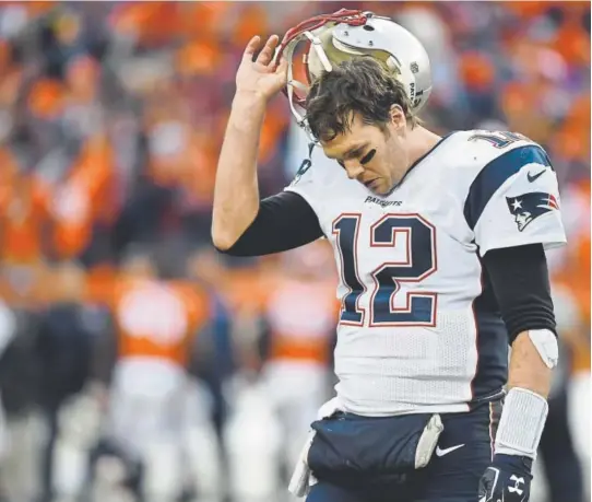  ?? John Leyba, Denver Post file ?? New England Patriots quarterbac­k Tom Brady has taken some lumps in Denver, where he is just 3-7 against the Broncos.