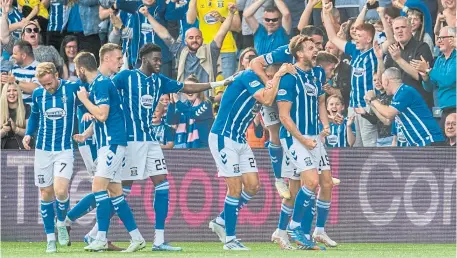  ?? ?? Ash Taylor celebrates scoring Killie’s winner