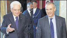  ?? REUTERS ?? Carlo Cottarelli (R) with Italy’s President Sergio Mattarella
