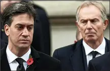  ??  ?? Grim: Miliband and Blair on Remembranc­e Sunday