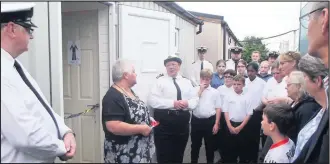  ??  ?? Pictured: Lt Cdr David Nichol, Mrs Sarina Martin and members of the ship’s company.