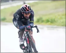  ??  ?? Ecuador’s Jhonatan Narváez pedals alone on his way to win the 12th stage of the Giro d’Italia cycling race from Cesenatico to Cesenatico, Italy on Oct
15. (AP)