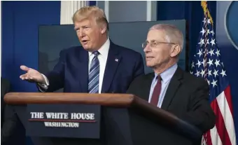  ?? GETTY IMAGES ?? INFORMING THE PUBLIC: President Trump and Anthony Fauci, director of the National Institute of Allergy and Infectious Diseases, hold a press briefing with members of the White House Coronaviru­s Task Force on Sunday in Washington, D.C.