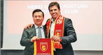  ?? PHOTO FROM THE CLUB’S WEBSITE ?? Chris Coleman (right), former Wales, Sunderland and Fulham coach, has taken over as the new manager of Chinese Super League outfit Hebei China Fortune.