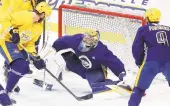  ?? MARK HUMPHREY/ASSOCIATED PRESS FILE ?? When the NHL suspended play in mid-March, Pekka Rinne, pictured, watched from the bench as Juuse Saros started.