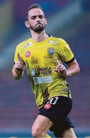  ?? HAKIM ZUBIR PIC BY LUQMAN ?? Perak’s Wander Luiz celebrates his second goal against PKNS in their Malaysia Cup quarter-fiinal match on Sunday.