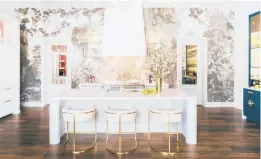  ?? NICHOLAS MELE/JIM DOVE SHOWROOM ?? Designer Jim Dove’s West Palm Beach showroom. De Gournay’s L’Eden wallpaper is placed with an enchanting forest scene.