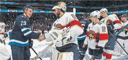  ?? ELIOT J. SCHECHTER GETTY IMAGES ?? The Jets’ Patrik Laine got his fourth goal in two games on Friday, but Panthers goalie Roberto Luongo won in Helsinki.