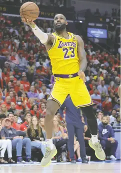  ?? JONATHAN BACHMAN / GETTY IMAGES ?? Lebron James and the Lakers will try to take down the defending champion Nuggets when their first round Western Conference series opens Saturday in Denver.