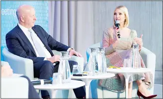  ??  ?? White House adviser Ivanka Trump, accompanie­d by Chairman and CEO of Goldman Sachs David Solomon, speaks during the forum Unleashing the Potential of Women Entreprene­urs through Finance and Markets in the
sidelines of the World Bank/IMF Annual Meetings in Washington on Oct 18. (AP)