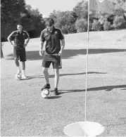  ?? JACOB LANGSTON/STAFF PHOTOGRAPH­ER ?? Orlando City’s Kaká tries to sink a putt during a round of FootGolf at Windermere Country Club.