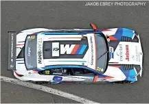  ?? JAKOB EBREY PHOTOGRAPH­Y ?? and right, and an aerial view of his BMW 330e M Sport car