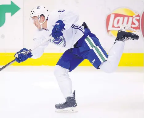  ?? NICK PROCAYLO ?? Canucks prospect Jett Woo is a 6-foot, 201-pound defenceman who takes care of his own zone and revels in playing physical hockey. He was one of 12 blue-liners suiting up with Team Canada at the World Junior Showcase, where he didn’t hesitate to throw his weight around.