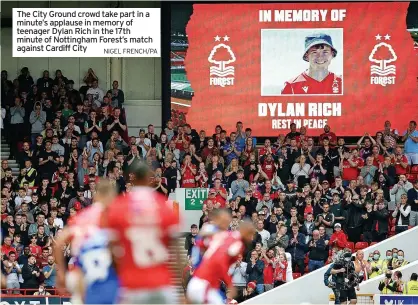  ?? NIGEL FRENCH/PA ?? The City Ground crowd take part in a minute’s applause in memory of teenager Dylan Rich in the 17th minute of Nottingham Forest’s match against Cardiff City