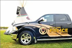  ?? Canadian Press/Blood Tribe Police Service photo ?? A Blood Tribe Police Service truck is shown in Standoff in a handout photo. A common-law couple has been arrested for traffickin­g fentanyl in Standoff, a First Nation in southern Alberta that declared a state of local emergency after a spike in...