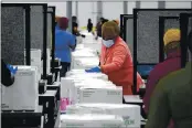  ?? PAUL SANCYA — THE ASSOCIATED PRESS FILE ?? Boxes containing the Moderna COVID-19 vaccine are prepared to be shipped at the McKesson distributi­on center in Olive Branch, Miss., on Sunday.