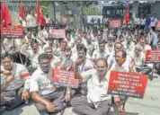  ??  ?? HAL trade unions staging a protest demanding for fair and early settlement of wage revision of employees in Bengaluru on Monday. PTI