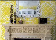  ?? The Washington Post/JOHN McDONNELL ?? Susan Nelson and Todd Martz styled this mantel in a family room at the 2017 DC Design House in Potomac, Md. The bold wallpaper called for a simple object to hang above the fireplace. The accessorie­s were chosen for their childlike qualities.