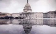  ?? J. SCOTT APPLEWHITE/ASSOCIATED PRESS ?? The U.S. Capitol is seen during a heavy rain in Washington Friday.