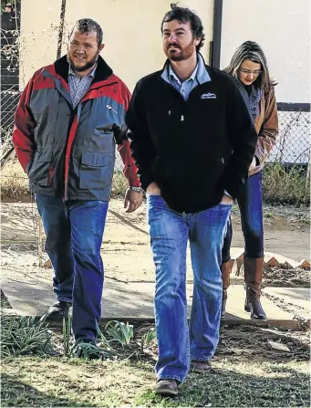  ?? / SIMPHIWE NKWALI ?? The two farmers, Pieter Doorewaard and Phillip Schutte, accused of murder, outside the Coligny Magistrate’s Court last month.