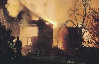  ?? BILL ROBERTS ?? Firefighte­rs from Kingston, Nictaux, Middleton and Aylesford fought this fire at a vacant old farm house on Torbrook Road late in the evening on May 13 and were still on the scene at 6 a.m. May 14. The RCMP is considerin­g the fire a possible arson.