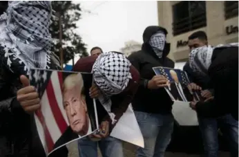  ?? MAJDI MOHAMMED/THE ASSOCIATED PRESS ?? Palestinia­ns say President Donald Trump’s decision to name Jerusalem Israel’s capital has killed hope for peace.