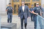  ?? [AP PHOTO] ?? Michael Cohen leaves federal court Tuesday in New York.