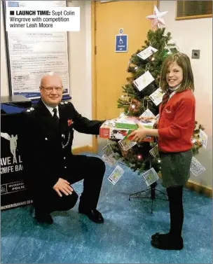  ??  ?? LAUNCH TIME: Supt Colin Wingrove with competitio­n winner Leah Moore