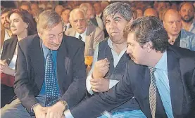 ??  ?? Socios. Con Néstor Kirchner y Hugo Moyano en la campaña de 2003.