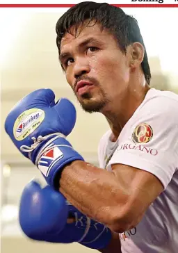  ?? GETTY IMAGES ?? Knockout blow? Manny Pacquiao will retire from boxing under a cloud and with his political ambition on the ropes
