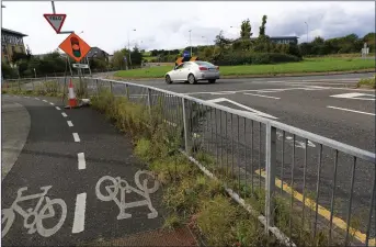  ??  ?? The roundabout on the Farrankell­y road between Kilcoole and Charleslan­d.