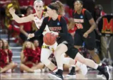  ?? THE ASSOCIATED PRESS ?? Princeton’s Gabrielle Rush, right, handles the ball as Maryland’s Kristen Confroy, left, defends during Friday’s first-round NCAA Tournament game.