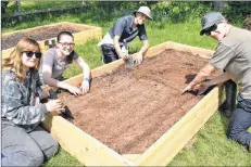  ?? DESIREE ANSTEY/JOURNAL PIONEER ?? Angela Benoit-Purdy, left, Tiana Trowsdale, Paul Sullivan and Colton Bulger of the 1231 Kensington Royal Canadian Army Cadet Corps were helping plant the gardens at Ross’s Place in Kensington. “We’re planting carrots, peas, spinach, beans, beets and...