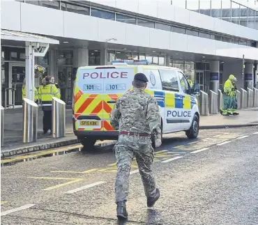  ?? ?? ↑ The scene at Glasgow Airport yesterday