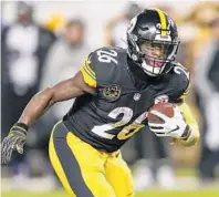  ?? KEITH SRAKOCIC/AP ?? Steelers running back Le'Veon Bell (26) has prepared all season for the playoffs, including waiting until Sept. 4 to sign his contract offer to avoid as much wear and tear as possible.