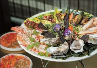  ??  ?? Seafood Platter — Ti Gong