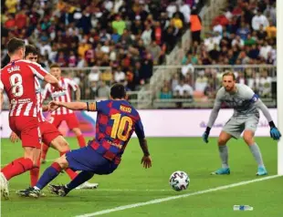  ?? Foto Giuseppe Cacace/AFP ?? Barçin as Lionel Messi in vratar Jan Oblak ne moreta pristati v isti skupini, možni tekmeci Atletica so Bayern, PSG, Juventus in Liverpool.