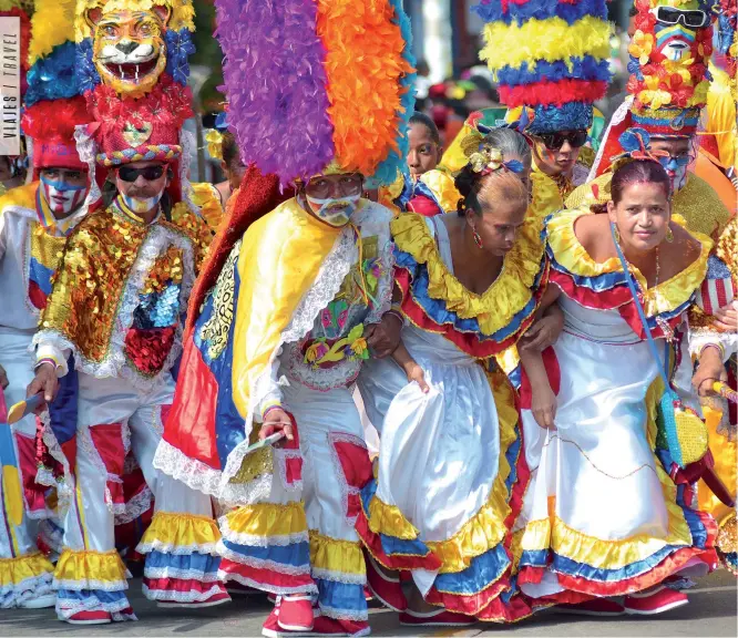  ??  ?? El Carnaval de Barranquil­la ha sido declarado Patrimonio Oral e Inmaterial de la Humanidad. The Carnival of Barranquil­la has been declared Oral and Intangible World Humanity.