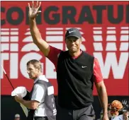  ?? ASSOCIATED PRESS FILE PHOTO ?? Tiger Woods celebrates after winning the Zozo Championsh­ip golf tournament at the 2019Accord­ia Golf Narashino country club in Inzai, east of Tokyo, Japan.