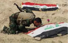  ?? KHALID MOHAMMED/THE ASSOCIATED PRESS ?? There are fears more mass graves will be found after the Tikrit discoverie­s.