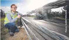  ??  ?? TAC’s David Young at wire barriers on Portarling­ton Rd, Moolap.