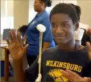  ?? Darrell Sapp/Post-Gazette ?? Jim Jamarcuspe­ck, a student at Westinghou­se Academy, backs away from a spaghetti tower he built with help from Westinghou­se engineers on the United Way Day of Caring in 2016.