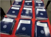  ?? J. SCOTT APPLEWHITE — THE ASSOCIATED PRESS FILE ?? In this file photo, copies of President Donald Trump’s first budget are displayed at the Government Printing Office in Washington.