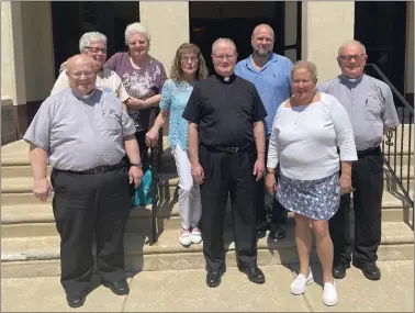  ?? PEG DEGRASSA - MEDIANEWS GROUP ?? The Our Lady of Peace 100th Anniversar­y planning committee stands outside of OLP Church in the
Milmont Park section of Ridley Township. Committee members include, left to right, Deacon John Ellis
Sr. of Glenolden, Diane McFadden of Ridley Township, Anna D’Ambrosio of Woodlyn, Jackie Basquill of Swarthmore, OLP Pastor Rev. Joseph Devlin, John Ellis Jr. of Swarthmore, Rosie Moran of Milmont Park, and Deacon Jim Basilio of Swarthmore.