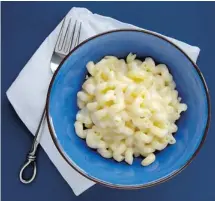  ?? GWENDOLYN RICHARDS/POSTMEDIA NEWS ?? Classic Mac from The Mac & Cheese Cookbook, with cavatappi pasta.