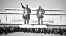  ?? AGENCE FRANCE PRESSE ?? People visit the statues of late North Korean leaders Kim Il-Sung and Kim Jong-Il to pay their respects on the occasion of the birthday of late North Korean leader Kim Jong Il, known as the “Day of the Shining Star”, in Pyongyang.
